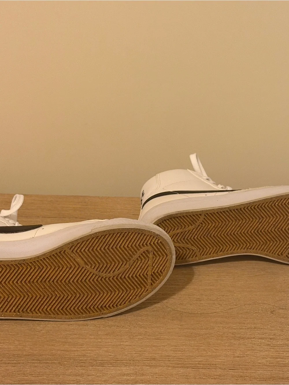Nike White High-Top Sneakers with Black Swoosh Accent